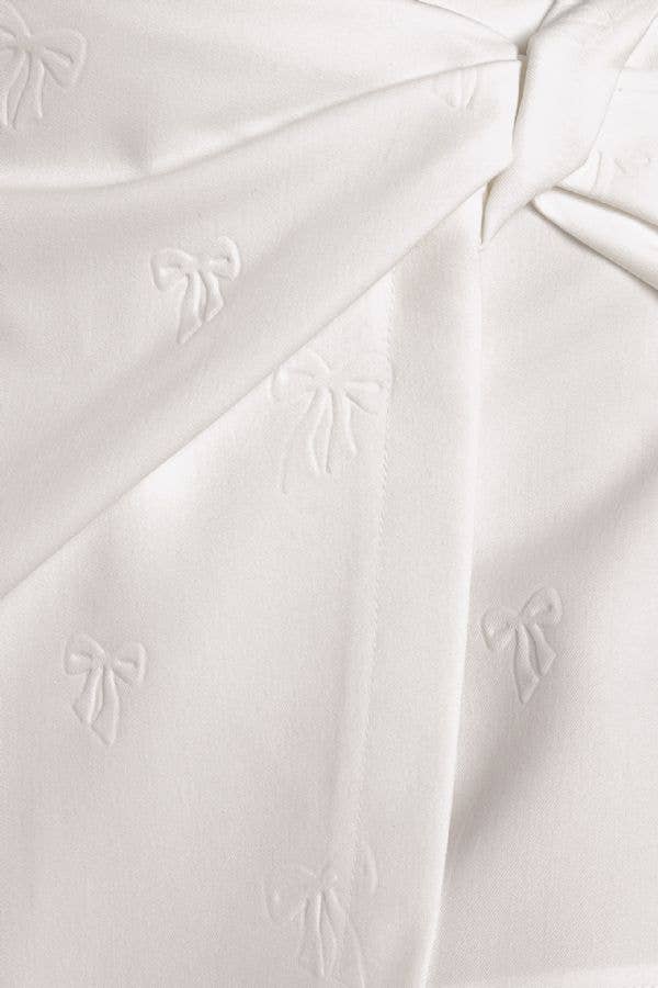 Bow embossed woven skort