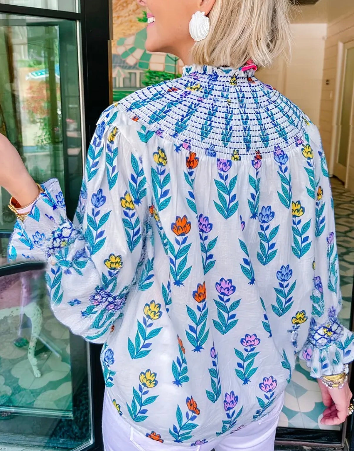 Smocked neck button down cream blouse with multicolor flowera
