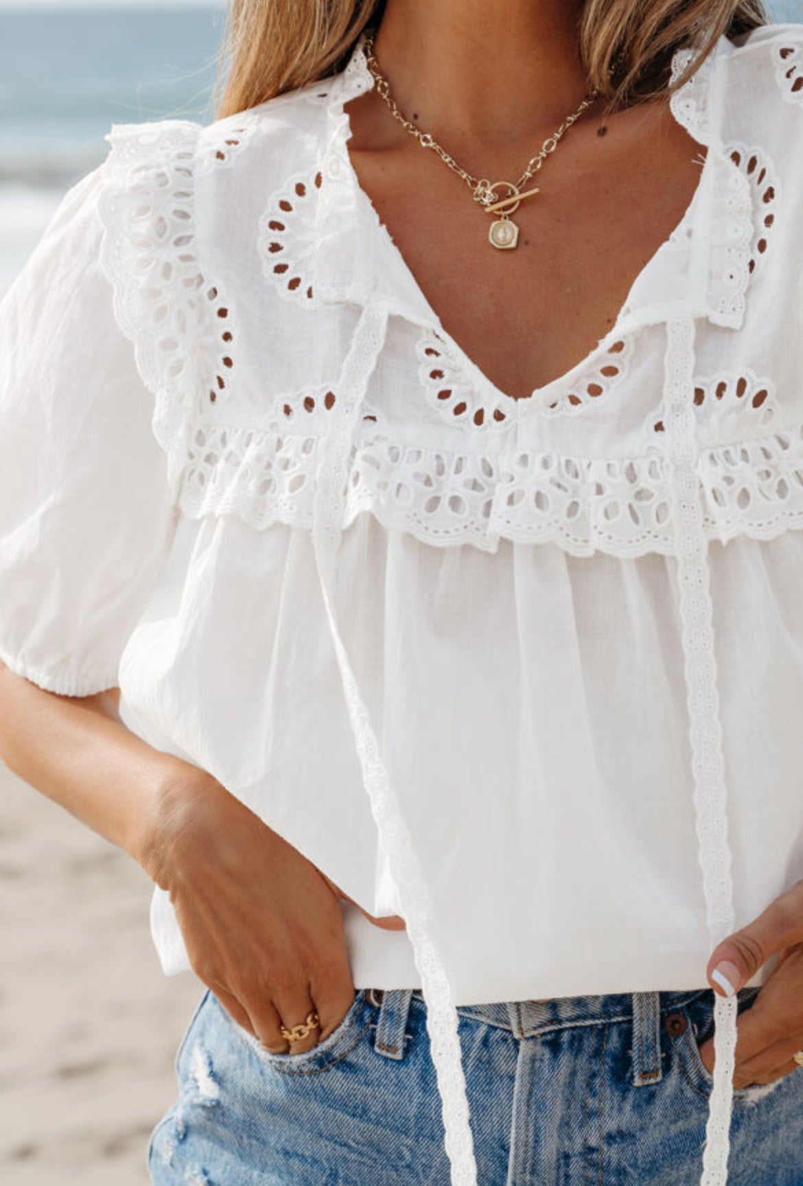 The Christa cotton eyelet tie neck blouse