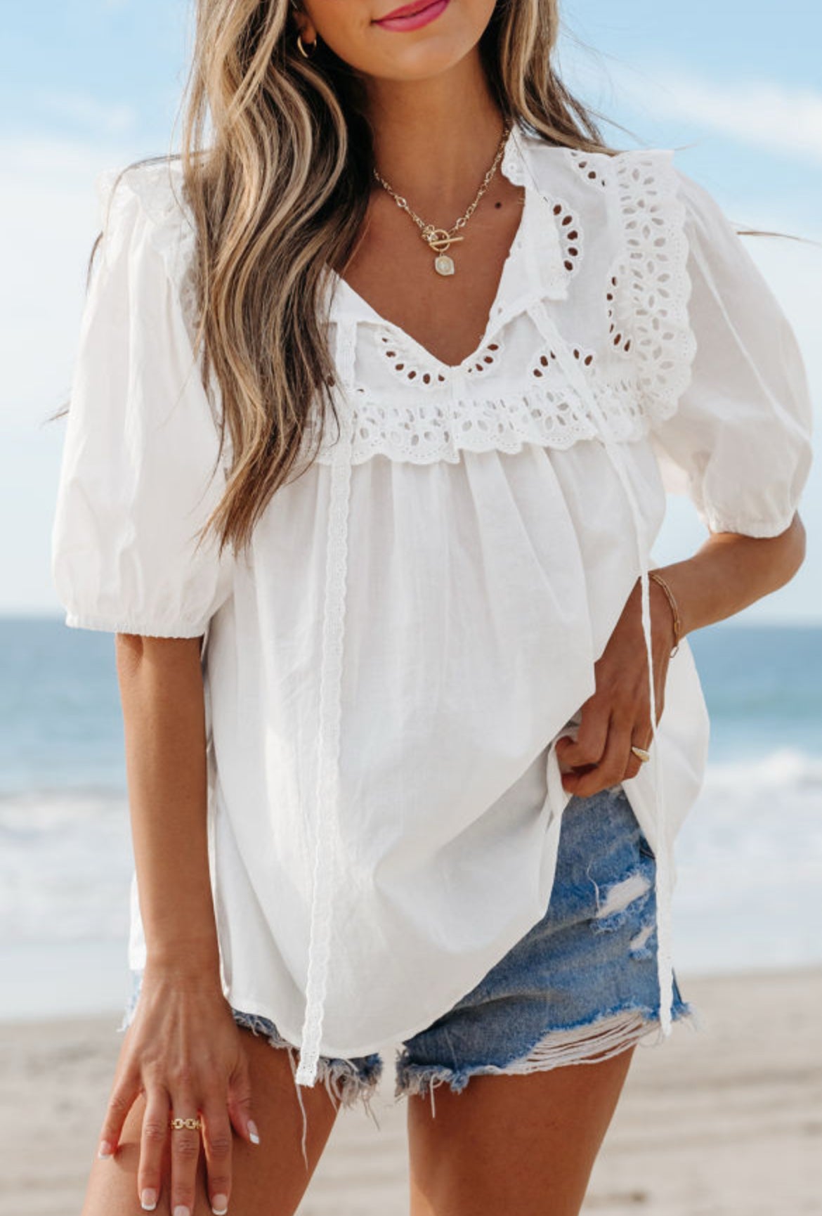 The Christa cotton eyelet tie neck blouse