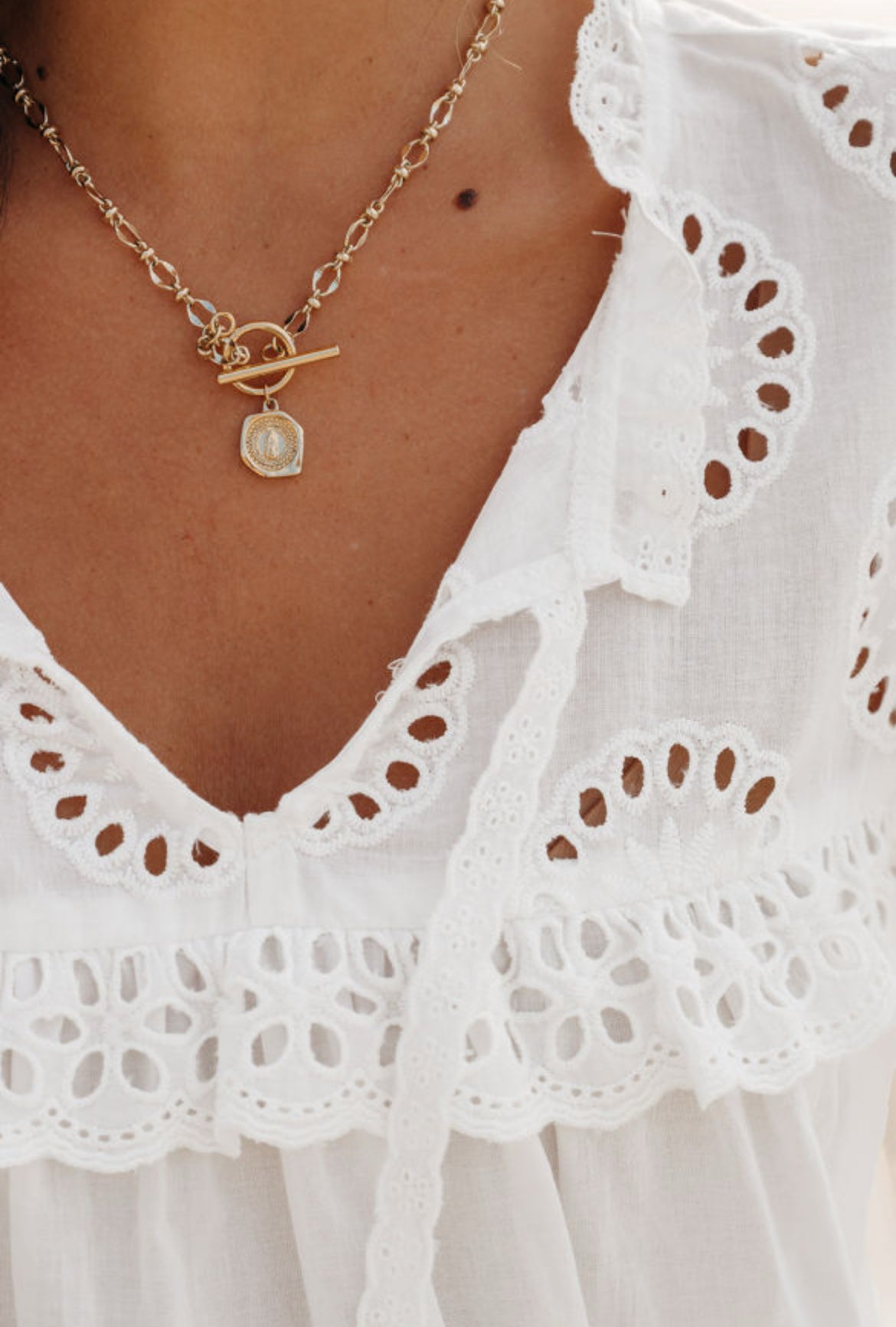 The Christa cotton eyelet tie neck blouse