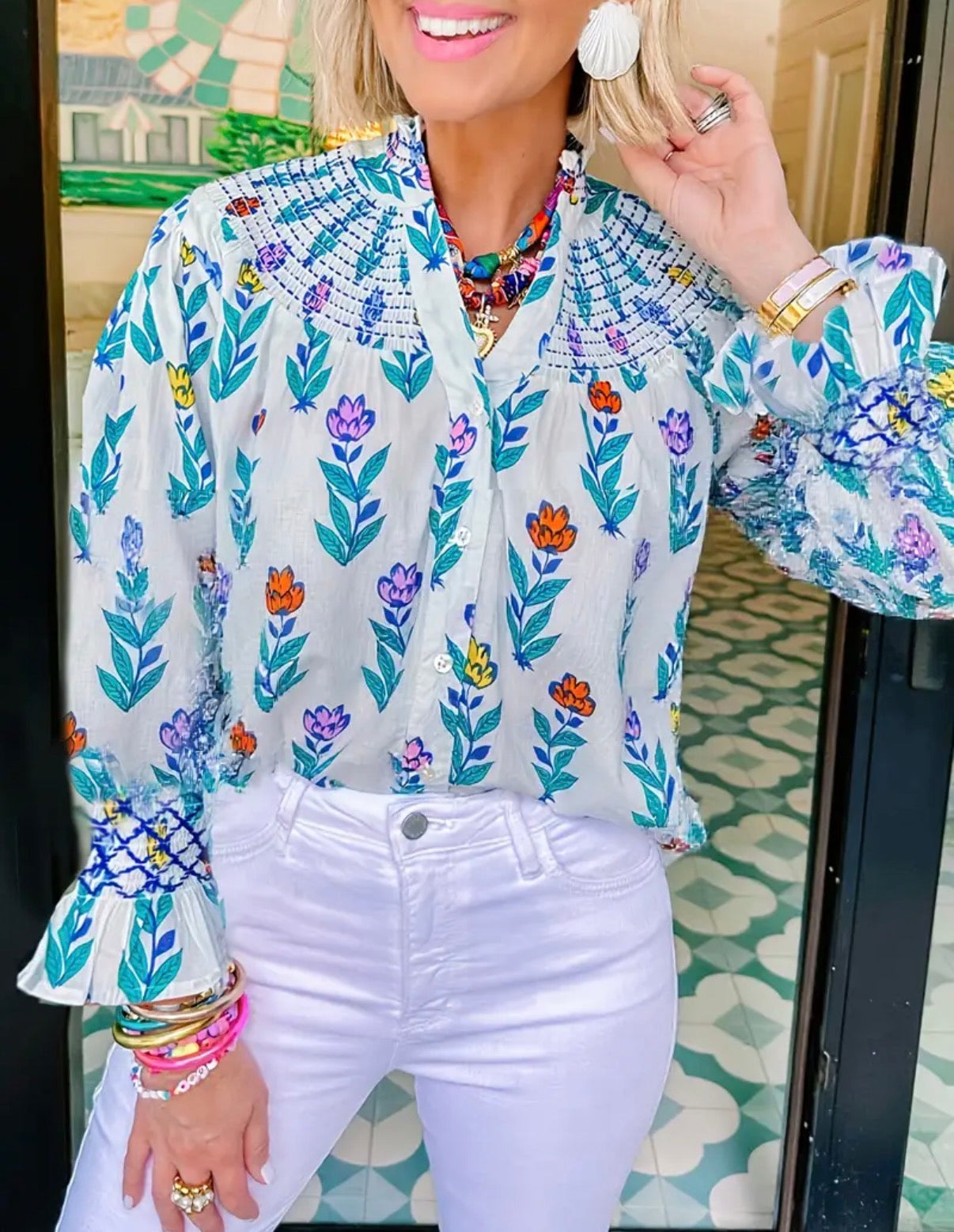 Smocked neck button down cream blouse with multicolor flowera