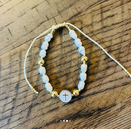 Pearl and gold cross bracelet