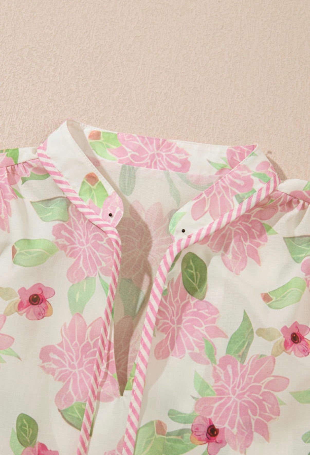Pink and green floral blouse with pinstripe trim