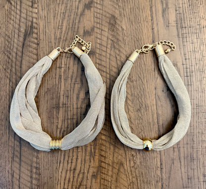 Gold mesh chain with ring pendant