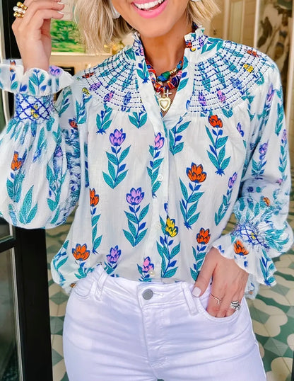 Smocked neck button down cream blouse with multicolor flowera