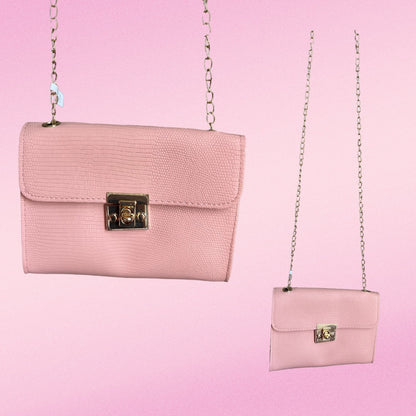 Pink purse with gold chain strap