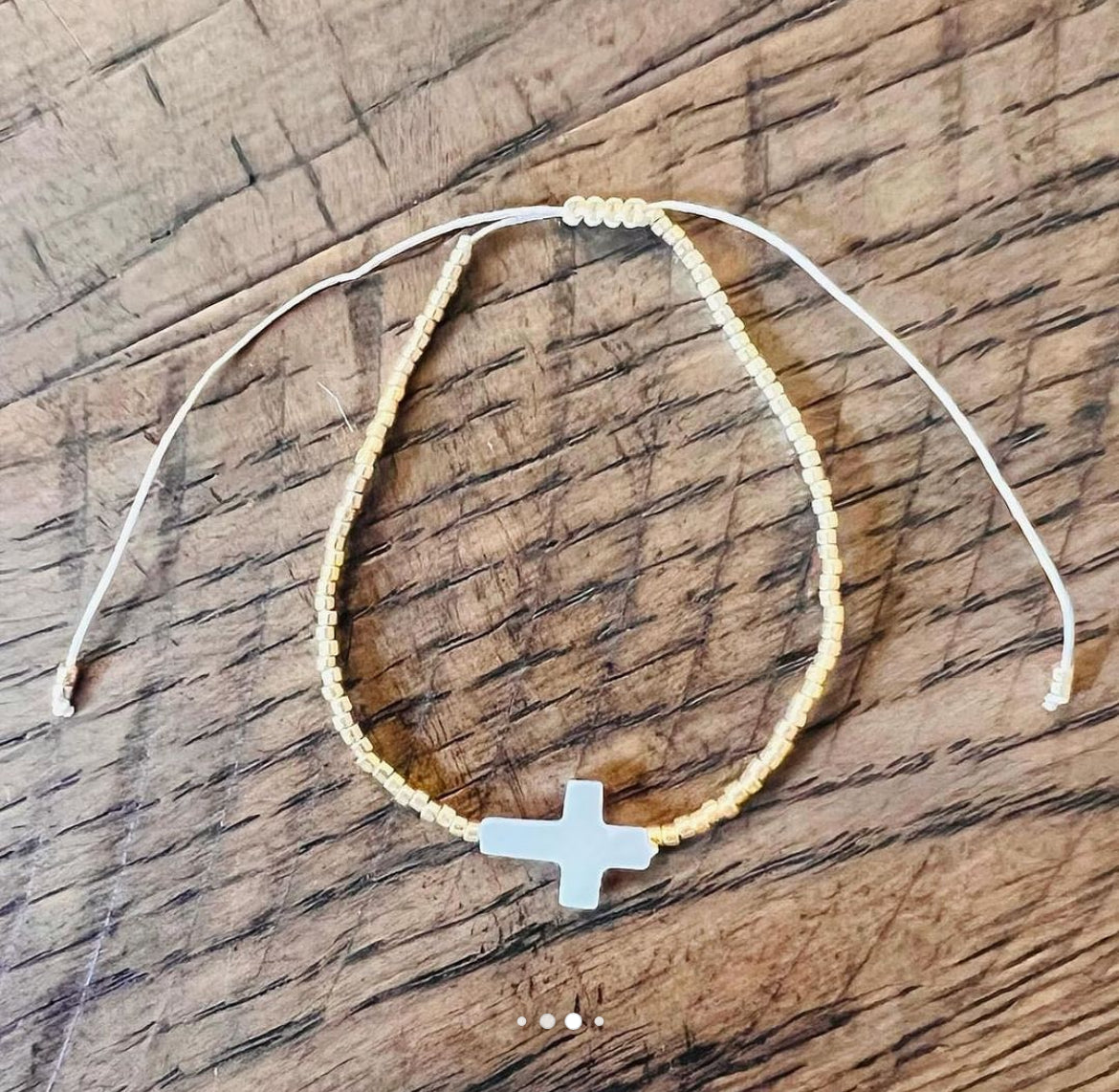 Gold beaded cross bracelet