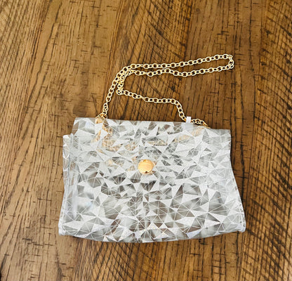 Clear purse with silver pattern